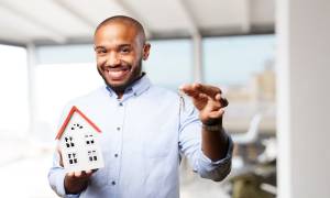 man-happy-holding-house-model-keys-to-property - illustration