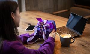 woman-remote-worker-purple-gift-box