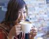 woman-smiley-sipping-classic-coffee