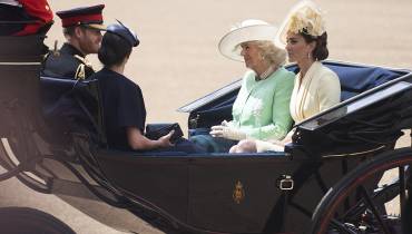 British Royals Camilla, Kate, Meghan, Prince Harry arrive in horse-drawn carriage