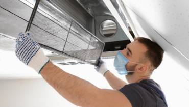 man clean_air_ducts_at_home- illustration