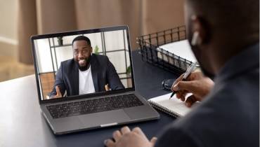man-using-laptop-virtual-interview