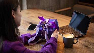 woman-remote-worker-purple-gift-box