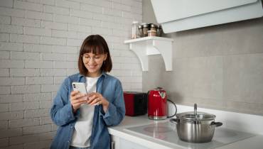 woman-using-home-technology-nudge-theory