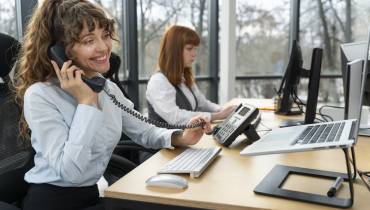 young-women-working-call-center-ai-call-recording-staff-wellbeing