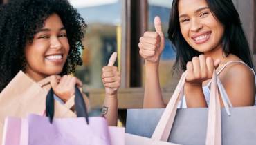 young-women-shopping-thumbs-up-customers-happy