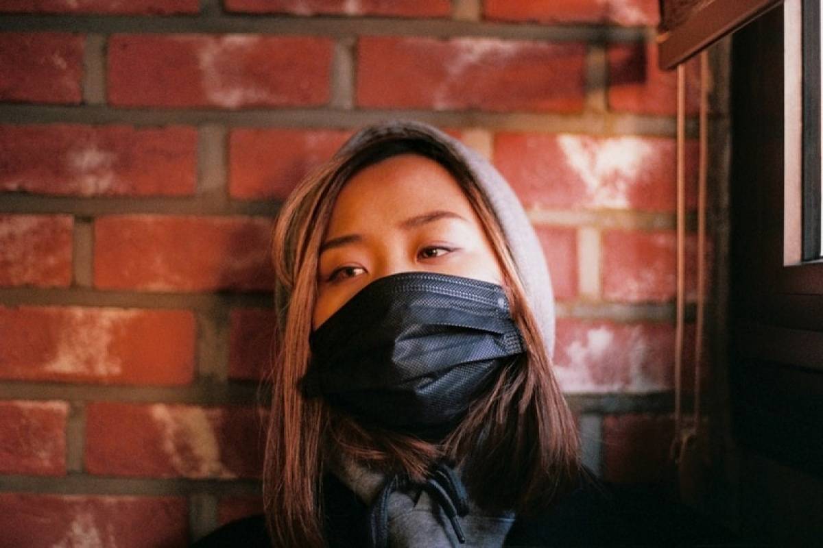 Woman-Wearing-Face-Mask-Science-Based Strategies to Cope with Coronavirus Anxiety