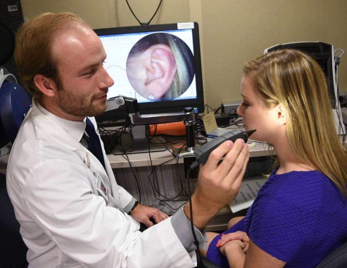 doctor-of-audiology-attending-to-female-patient