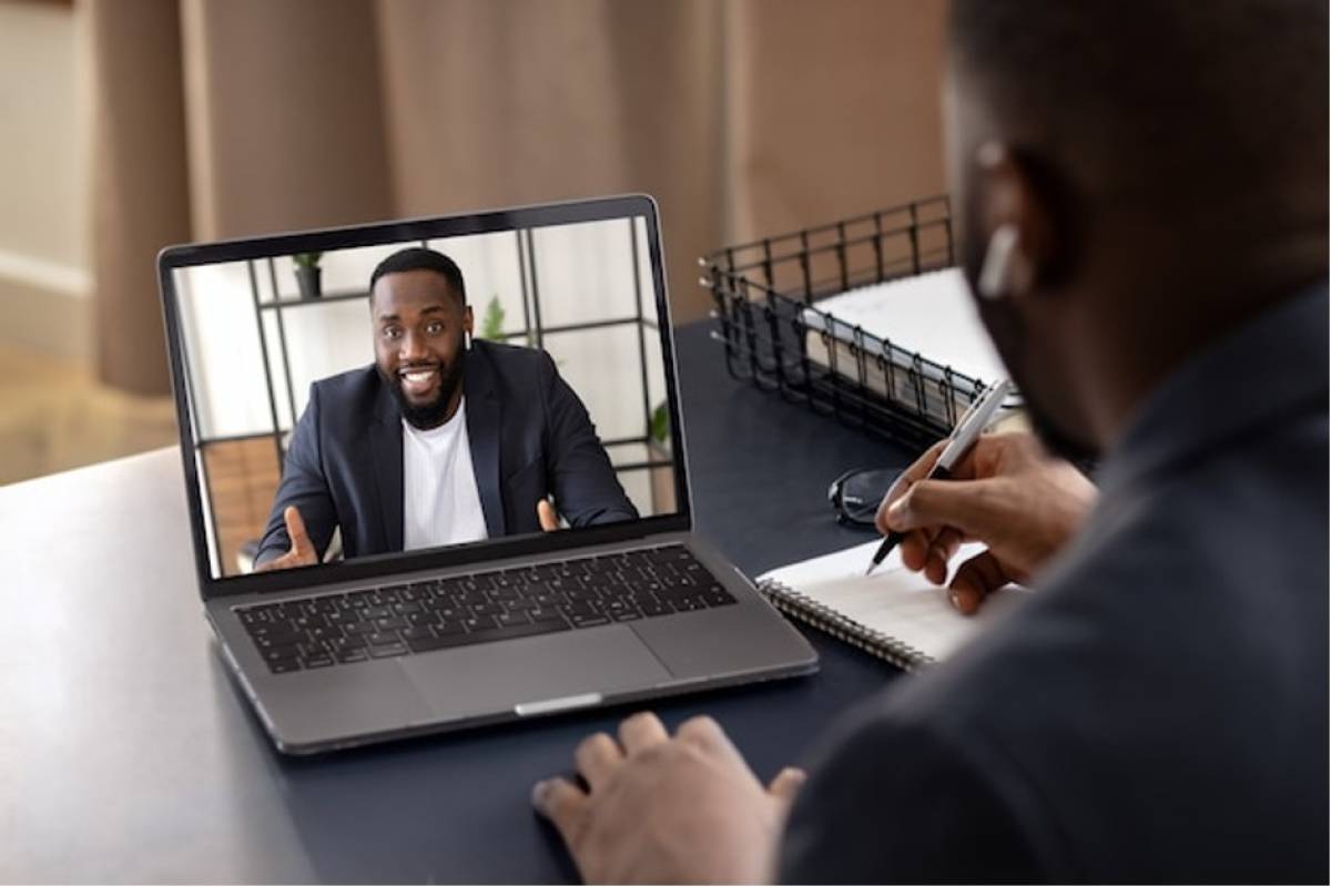 man-using-laptop-virtual-interview