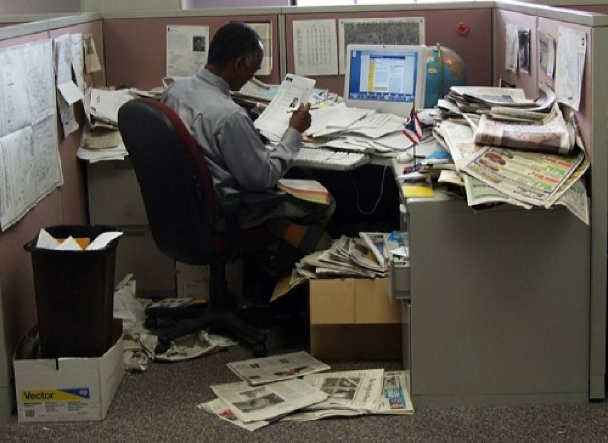 man-working-messy-office