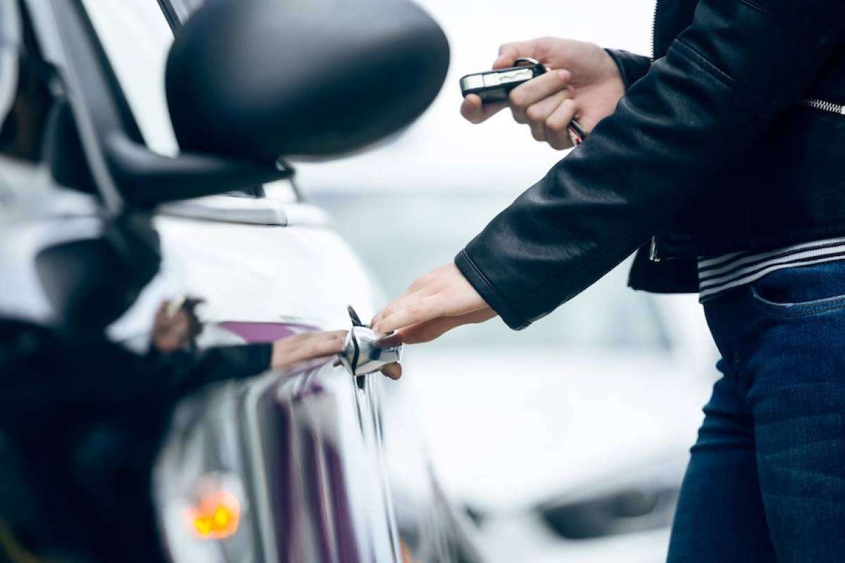 woman opening car security and safety