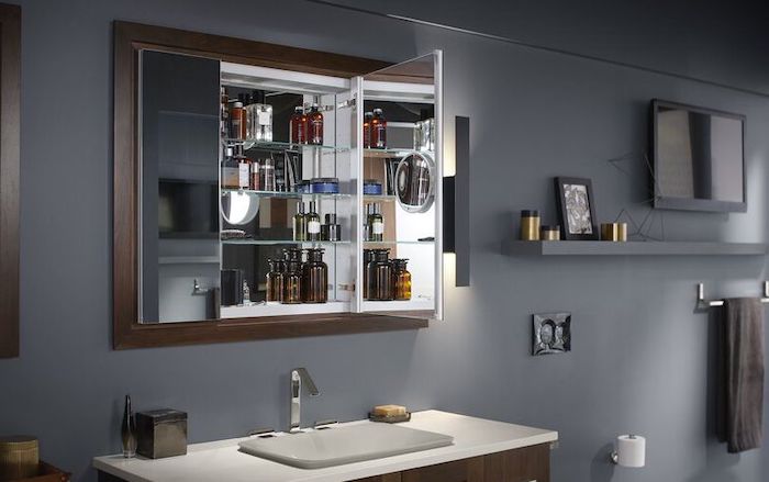 bathroom-medicine-cabinet-with-adjustable-magnifying-mirror-and-slow-close-door.jpg