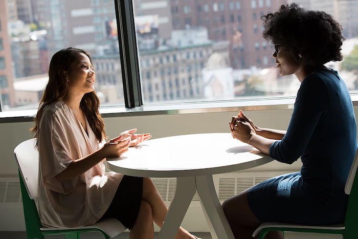 business-meeting-smile-desk-office-talking.jpg