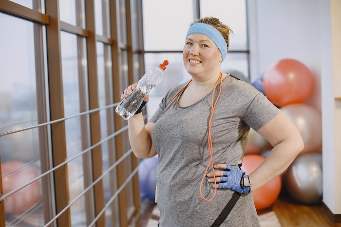 fat-woman-fitness-drinking-water.jpg