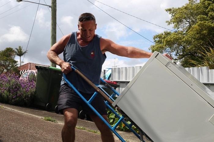 furniture_movers_moving_a_dishwasher.jpg