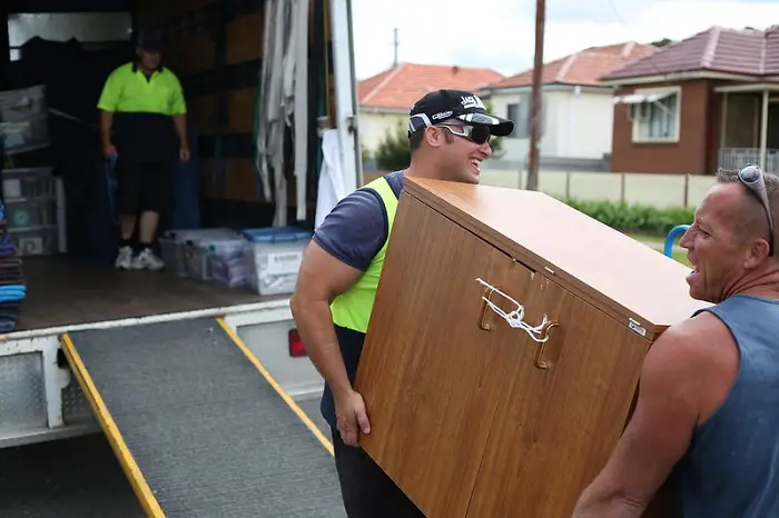 furniture_removalists_load_furniture_via_the_ramp_into_truck..jpg