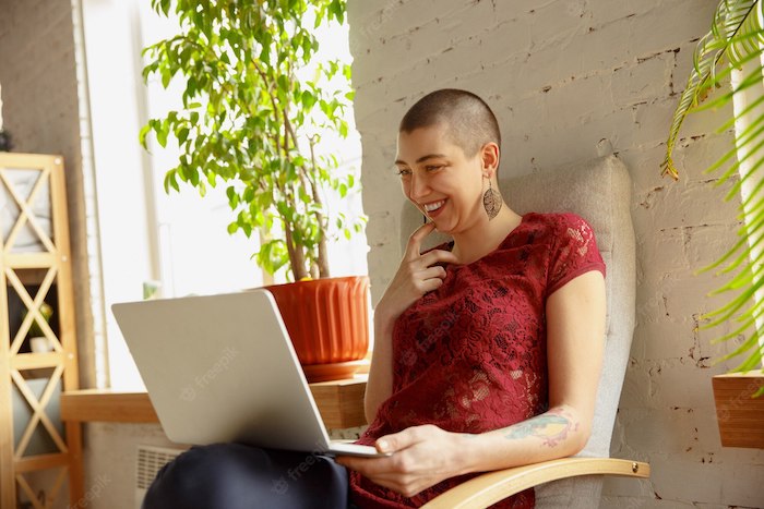 happy-woman-working-from-home-during-coronavirus-covid-19-quarantine-remote-office