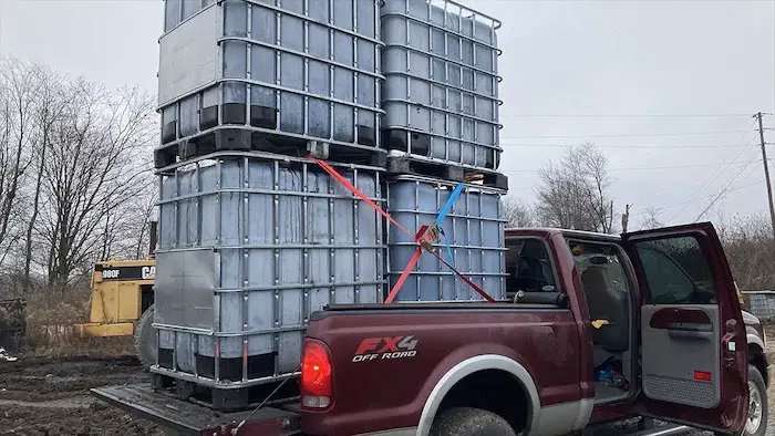 ibc-tote-tanks-transported-in-back-of-pick-up-vehicle.jpg