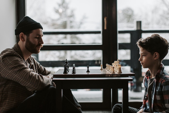 man-boy-playing-chess-.jpg