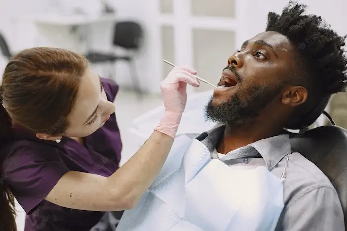 man-famale-dentist-checkup-teeth.jpg