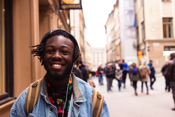 man-happy-streets-listening-to-music 