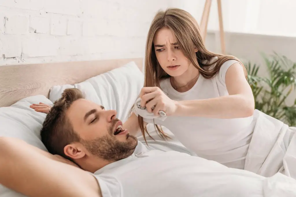 man-woman-in-bed-snoring-remedies.jpeg