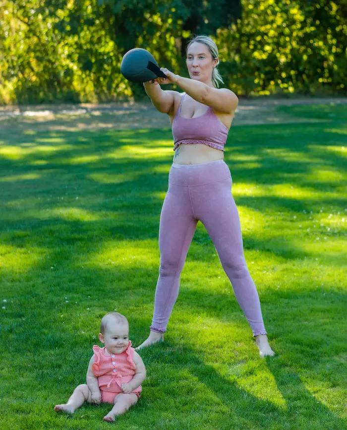 mother-exercising-squotes-baby-outdoors