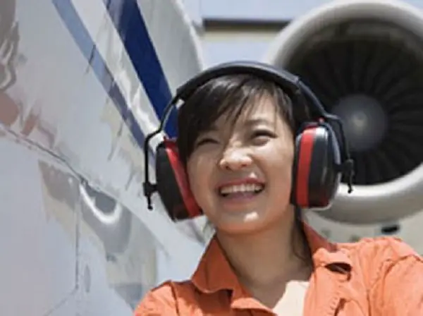 noise-occupational-harzard-woman-wearing-noise-cancelling-headphones-to-dampen-the-noise.jpg