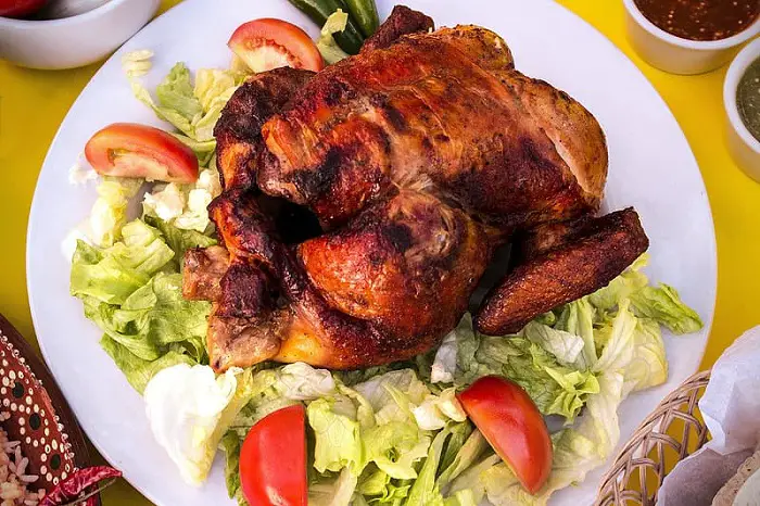 roasted-chicken-with-lettuce-and-tomatoes-on-plate.jpg