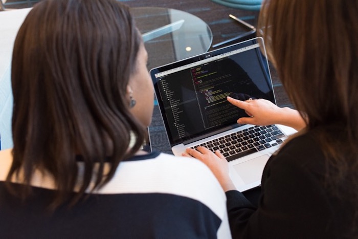 two-female-software-developers-working