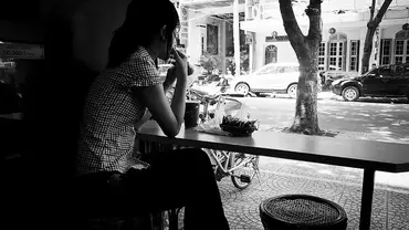 woman sitting at cafe.jpg