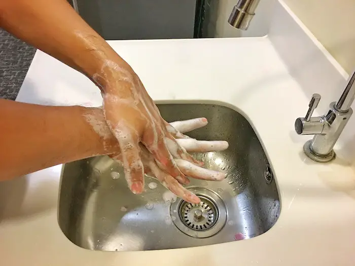 woman-sink-proper-handwashing-practices